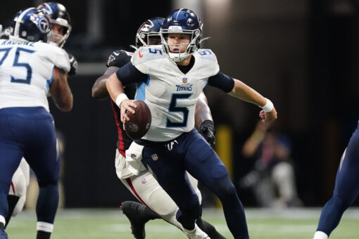 Woodside, Barkley throw TDs as Titans stop Falcons 23-3