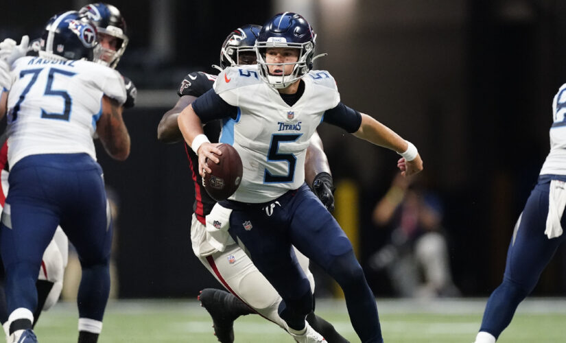 Woodside, Barkley throw TDs as Titans stop Falcons 23-3