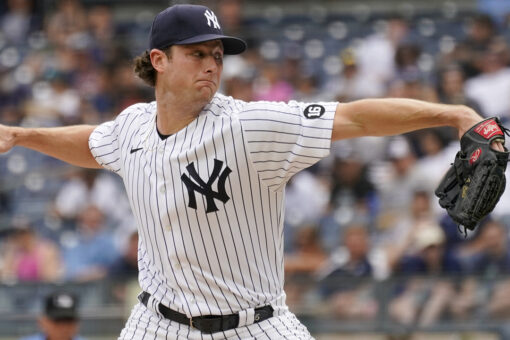 Cole whiffs Donaldson, pitches streaking Yanks past Twins