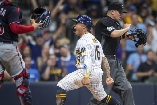Yelich drives in 6 runs, powers Brewers past Washington 9-6