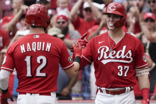 Naquin homers twice, Reds beat Marlins 3-1 to sweep series