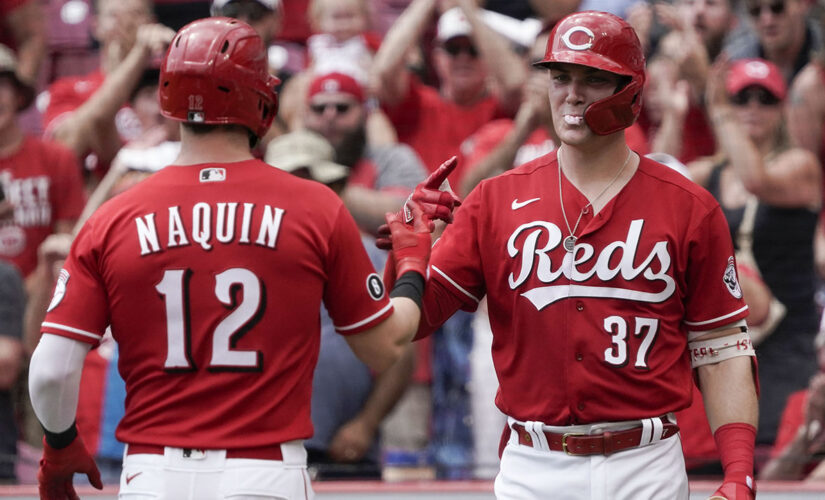 Naquin homers twice, Reds beat Marlins 3-1 to sweep series