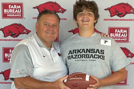 13-year-old college football hopeful hangs billboard to grab attention of Arkansas Razorbacks coach