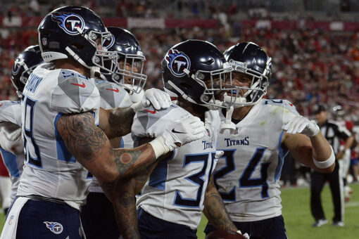 Titans defense shuts down Brady-less Buccaneers 34-3