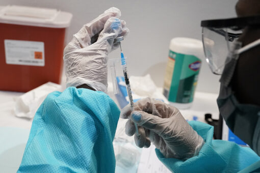 Biden says US weighing COVID-19 vaccine boosters five months after second dose
