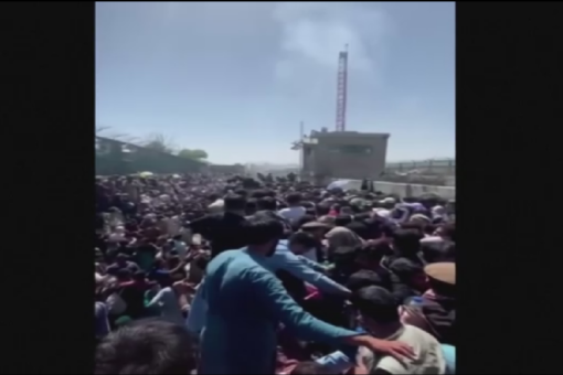 Afghan interpreter says Taliban beating women outside Kabul airport