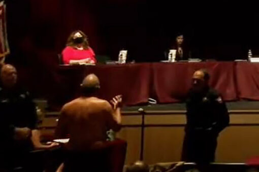 Texas man strips down to underwear over masks at heated school board meeting