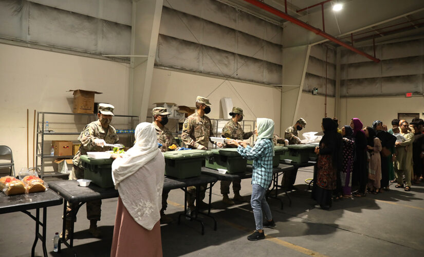 DoD releases photos of U.S. service members aiding Afghanistan evacuation efforts