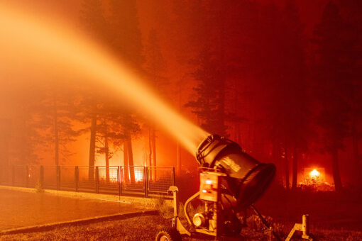 California firefighters use snow machines to fight Caldor Fire at Tahoe resort