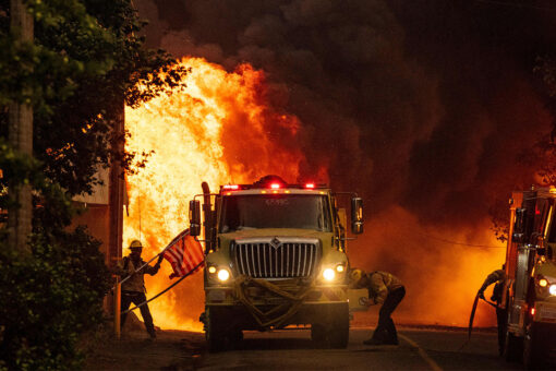 California firefighter saves US flag just feet away from flames of Dixie Fire