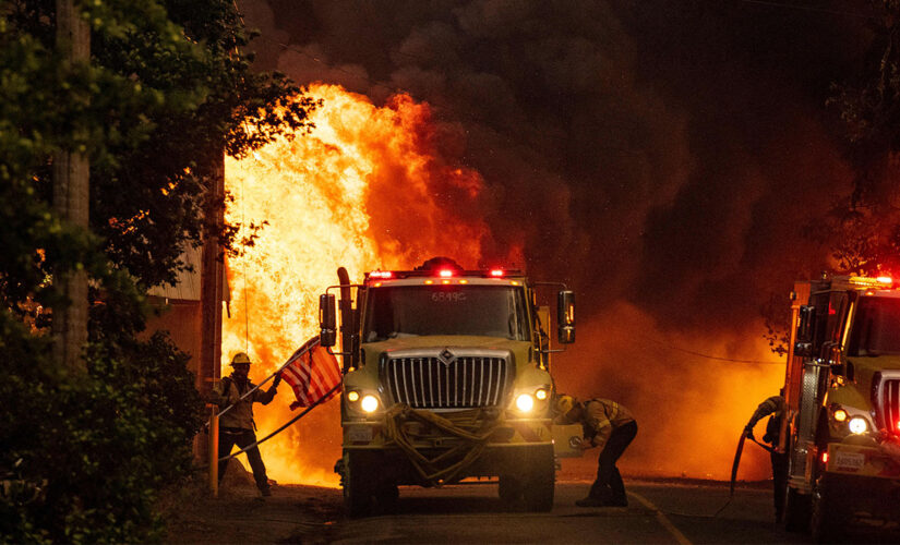 California firefighter saves US flag just feet away from flames of Dixie Fire