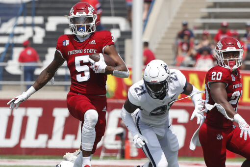 Haener, Fresno St. dismantle UConn 45-0 in sweltering heat