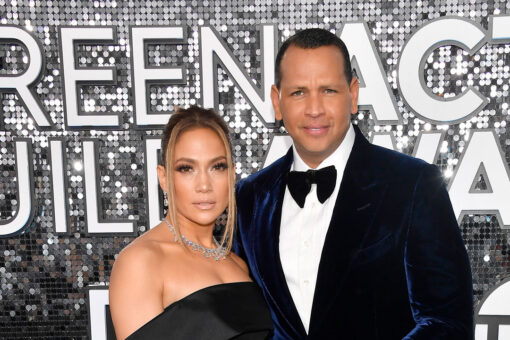 Alex Rodriguez poses with the Porsche he once gifted ex Jennifer Lopez