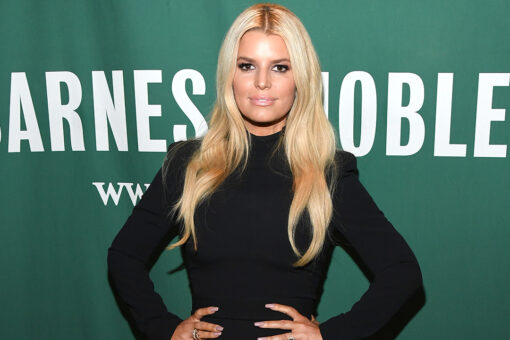 Jessica Simpson stuns in animal print dress for date night with husband Eric Johnson
