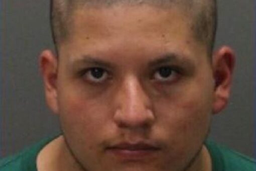 Friends of California movie theater shooting suspect believed he had gun, snuck out of cinema, detective says