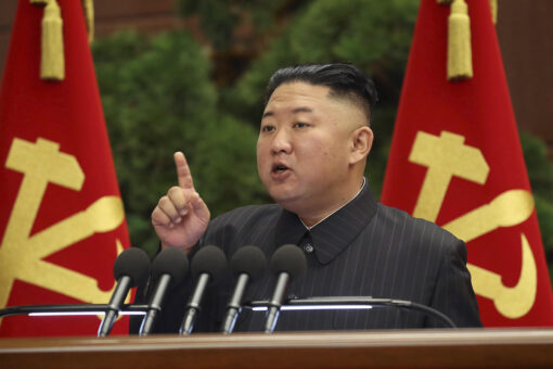 Kim Jong Un photographed with mystery spot, bandage on head