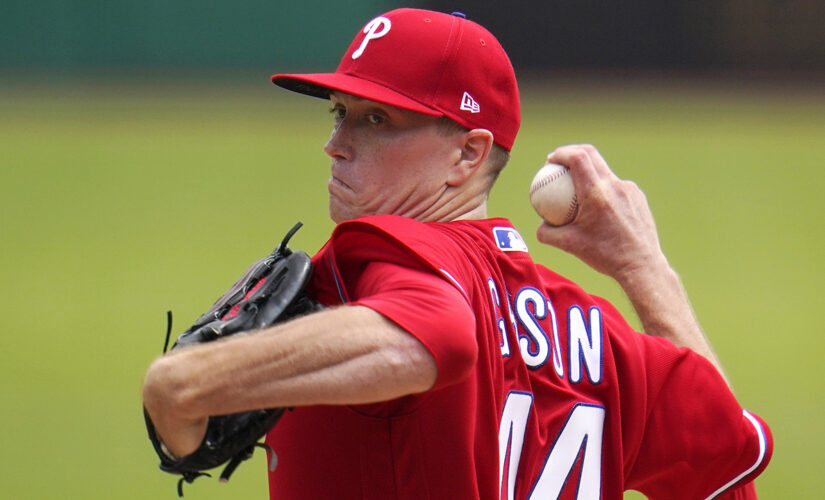 Gibson excels in Phils debut; Realmuto, Harper pound Pirates