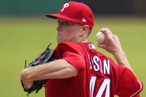 Gibson excels in Phils debut; Realmuto, Harper pound Pirates
