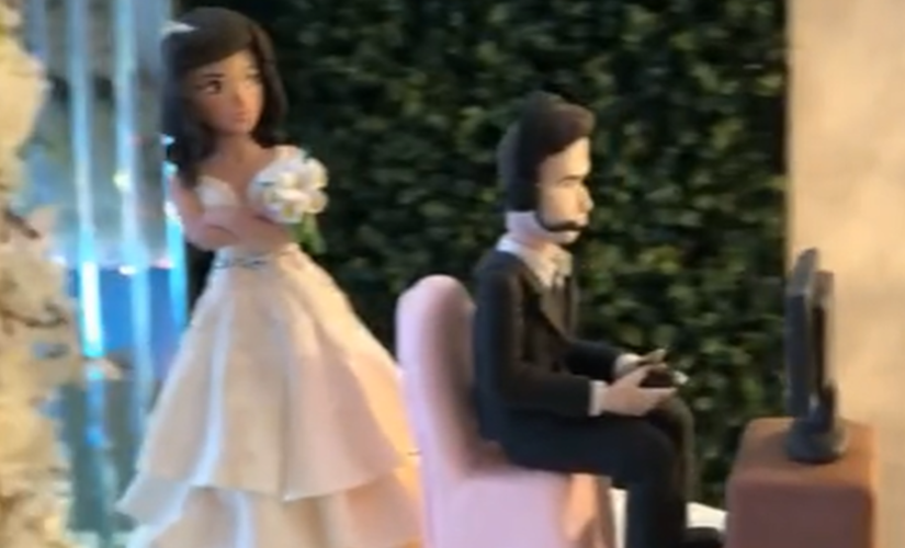 Couple speaks out after video game-themed wedding cake topper unexpectedly goes viral