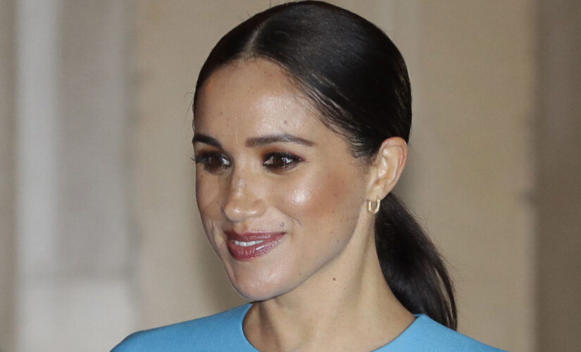 Meghan Markle’s absence at Prince Philip’s funeral ‘quietly pleased’ royal family, book claims