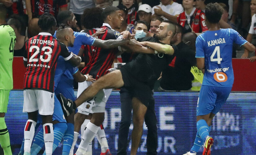 Nice-Marseille Ligue 1 match under review following chaos between players, fans
