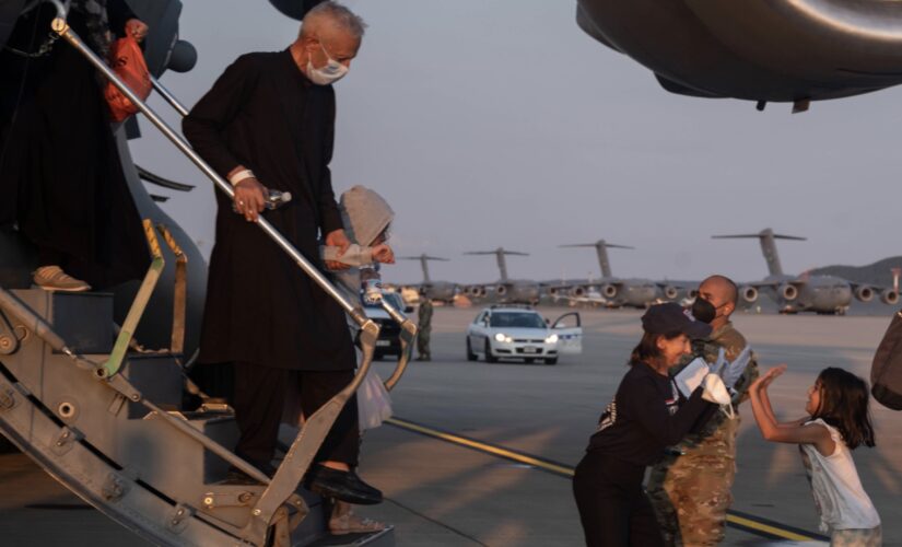First Afghanistan evacuees arrive in Germany: Photos