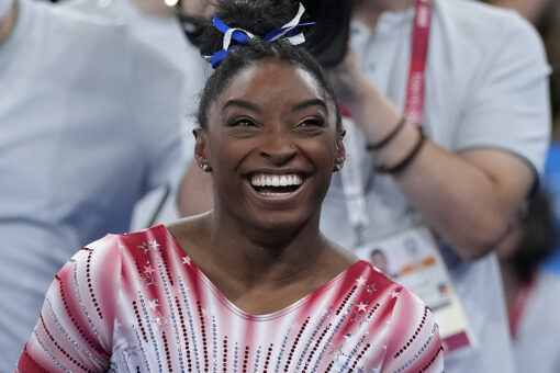 Simone Biles rocks tie-dye bikini after winning bronze at Tokyo Olympics