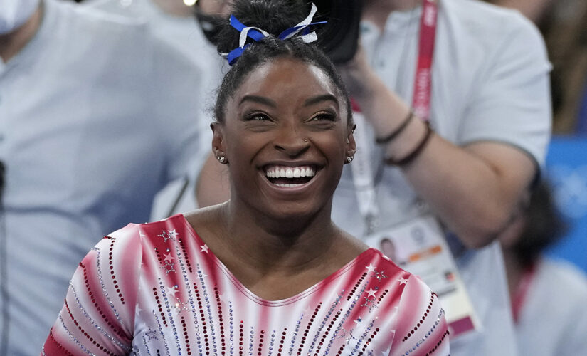 Simone Biles rocks tie-dye bikini after winning bronze at Tokyo Olympics