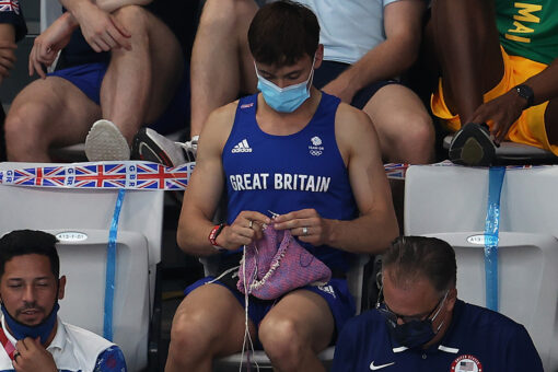 Great Britain’s Tom Daley knits on the sidelines of the Tokyo Olympics