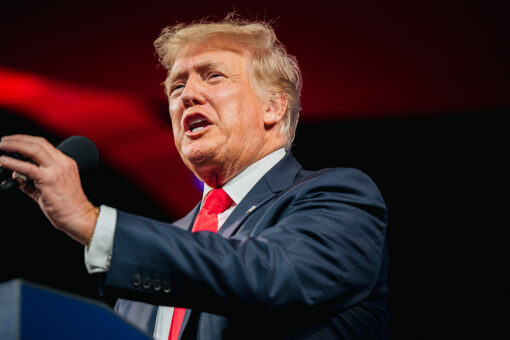 Trump targets Biden over Afghanistan but gets booed briefly on vaccines at Alabama rally