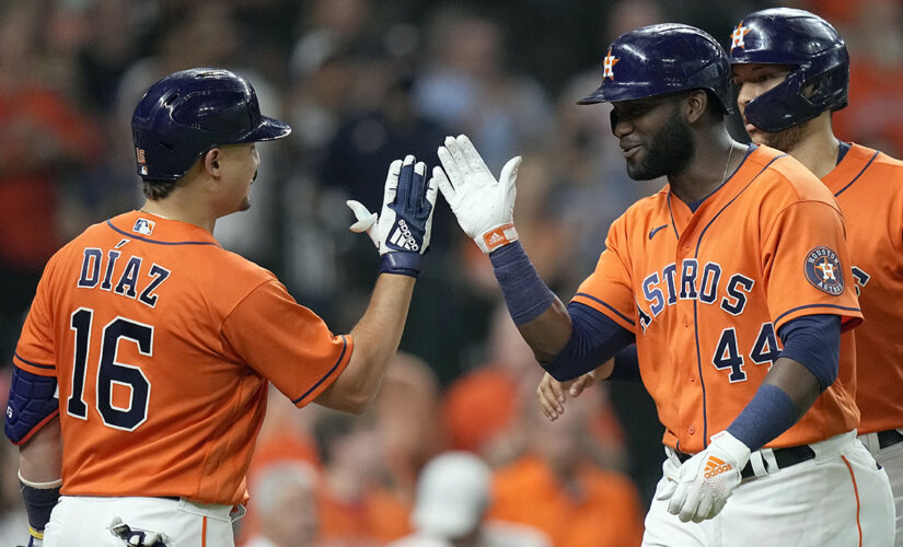 Álvarez, Astros slug their way to 12-3 win over Mariners