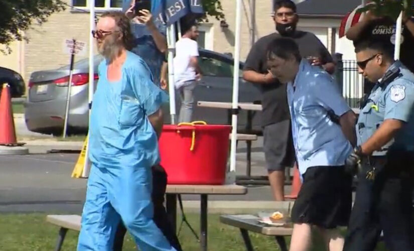 Illinois brothers in custody after police discover two bodies buried in backyard of home