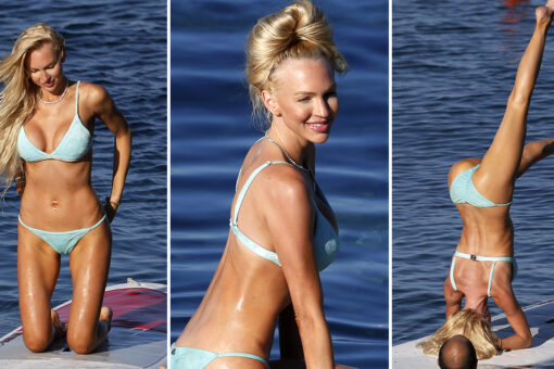 Christine Quinn performs splits, yoga poses in tiny blue bikini on paddleboard during Italian getaway