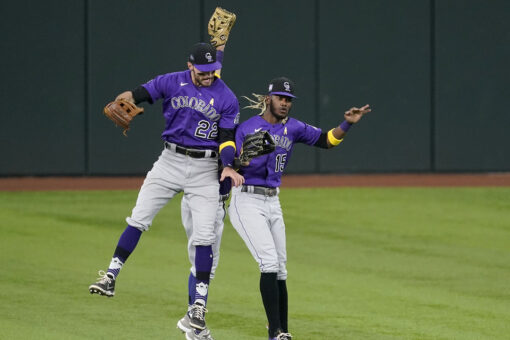 Rockies fall behind early, score 5 in 9th to beat Rangers