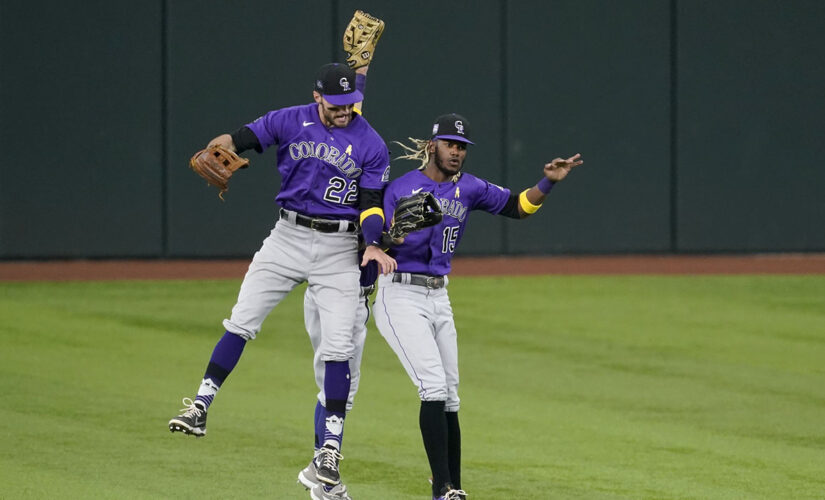 Rockies fall behind early, score 5 in 9th to beat Rangers