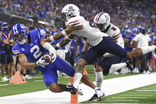 Hall throws 2 TDs, BYU beats Arizona 24-16 in Las Vegas