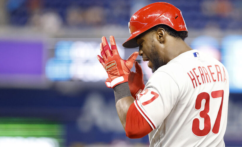 Herrera hits RBI single in 10th, Phils avoid sweep in Miami