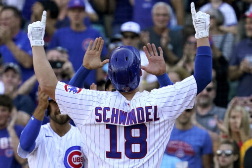 Schwindel’s grand slam lifts Cubs over Pirates 11-8