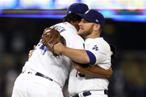 Dodgers clinch postseason berth in 8-4 win over D-backs