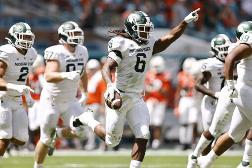 Spartans run: Michigan State rolls past No. 24 Miami, 38-17