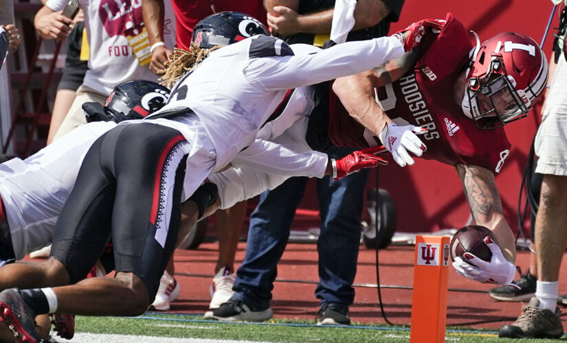 Ridder helps No. 8 Bearcats rally for 38-24 win at Indiana