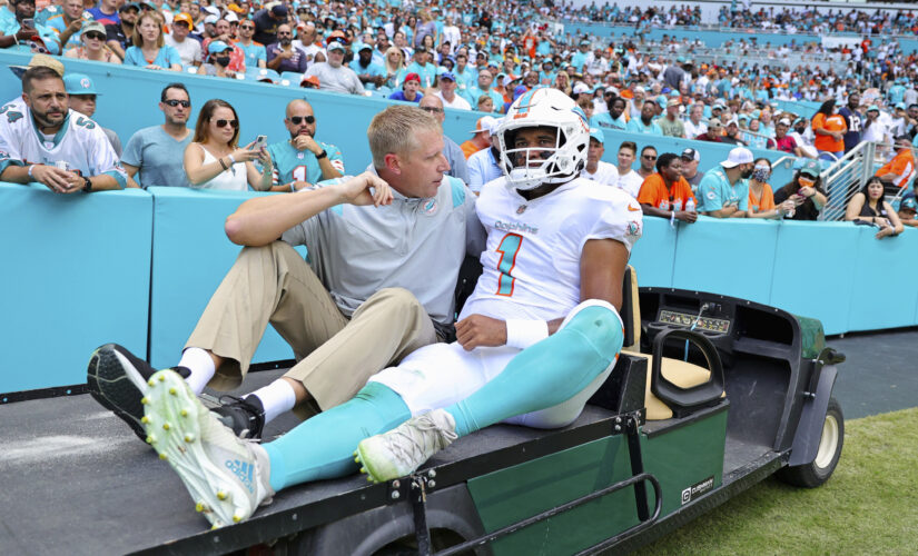 Dolphins’ Tua Tagovailoa carted off the field with rib injury after taking big hit