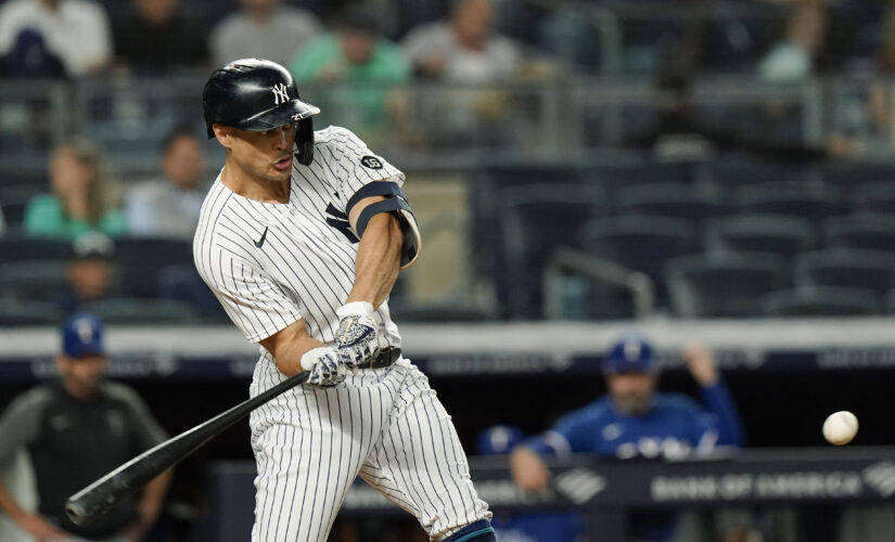 Yankees power past Rangers 7-1 to keep pace in playoff race