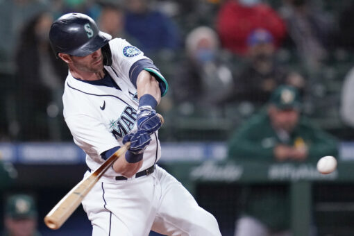 Haniger hits 2 HRs, M’s beat A’s to gain in wild-card race