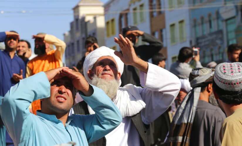 Witness: Taliban hang dead body in Afghan city’s main square