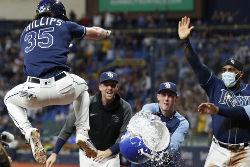 Phillips homers in 10th as Rays rally to beat Tigers 7-4
