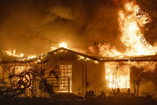 PG&E charged in California wildfire that killed four and destroyed hundreds of homes