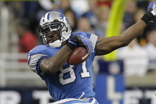 Calvin Johnson keeps reminding the Lions that they owe him money