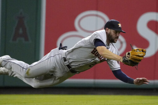 Astros move closer, beat Angels in 12; Ohtani out at plate