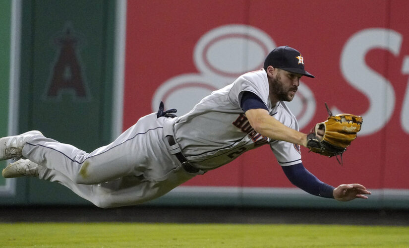Astros move closer, beat Angels in 12; Ohtani out at plate